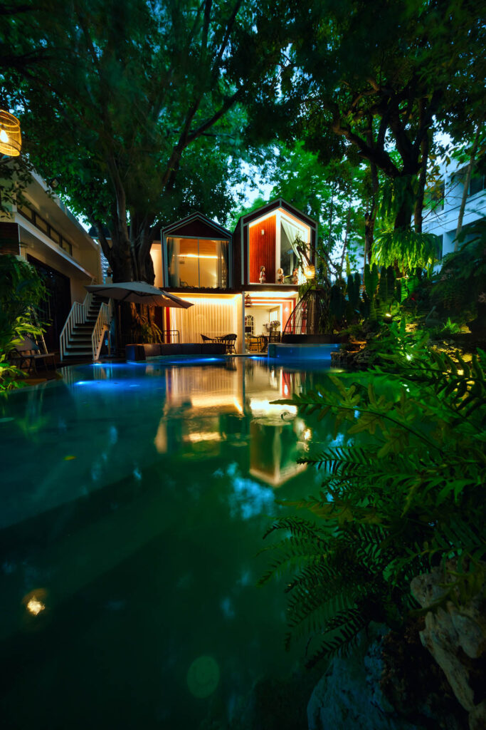 Nakorn Poolvilla lush garden and pool view